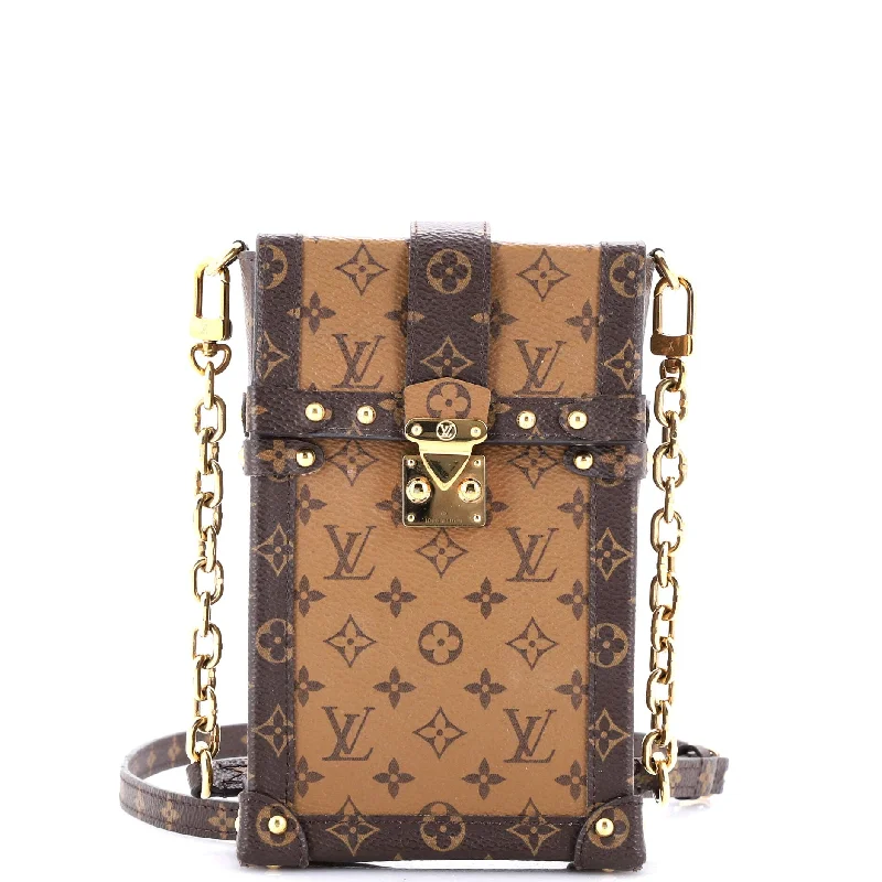 Vertical Trunk Pochette Reverse Monogram Canvas