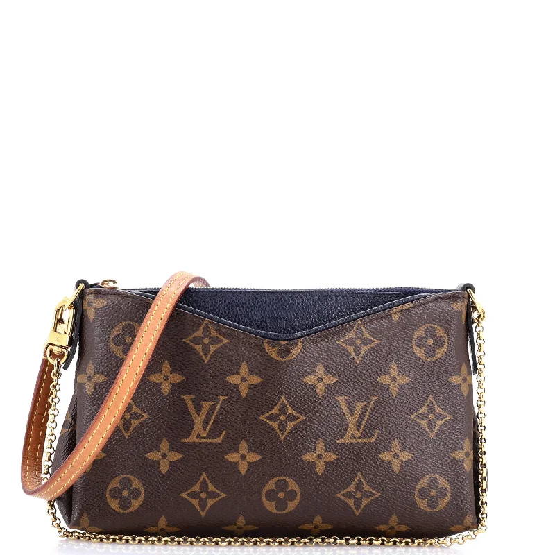 Pallas Clutch Monogram Canvas